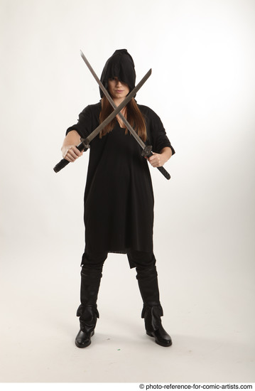 Woman Adult Average White Fighting with sword Standing poses Coat