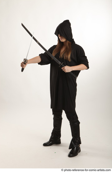 Woman Adult Average White Fighting with sword Standing poses Coat