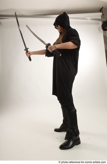 Woman Adult Average White Fighting with sword Standing poses Coat