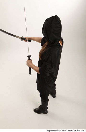 Woman Adult Average White Fighting with sword Standing poses Coat