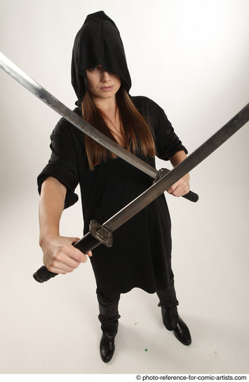 Woman Adult Average White Fighting with sword Standing poses Coat