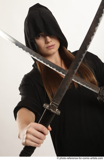 Woman Adult Average White Fighting with sword Standing poses Coat