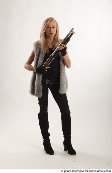 Woman Adult Average White Fighting with gun Standing poses Coat