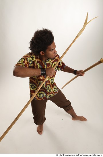 Man Adult Average Black Fighting with spear Standing poses Coat