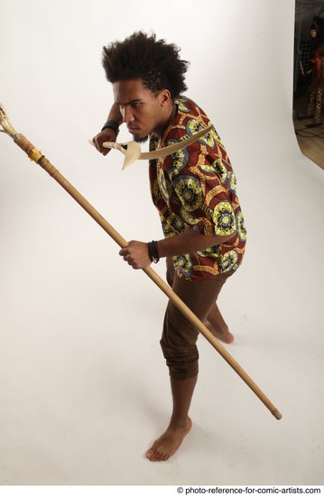 Man Adult Average Black Fighting with spear Standing poses Coat