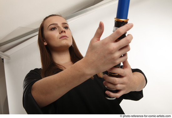 Woman Adult Average White Fighting with sword Standing poses Coat