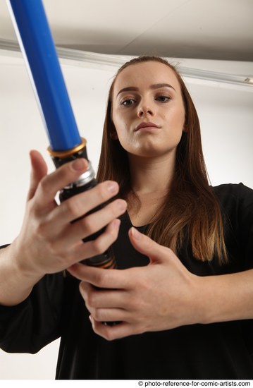 Woman Adult Average White Fighting with sword Standing poses Coat