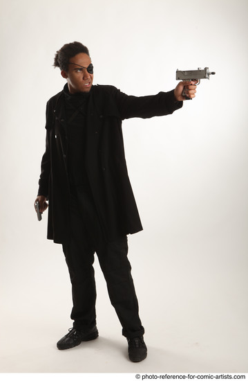 Man Adult Average Black Fighting with gun Standing poses Coat