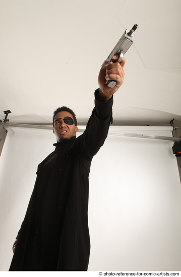 Man Adult Average Black Fighting with gun Standing poses Coat