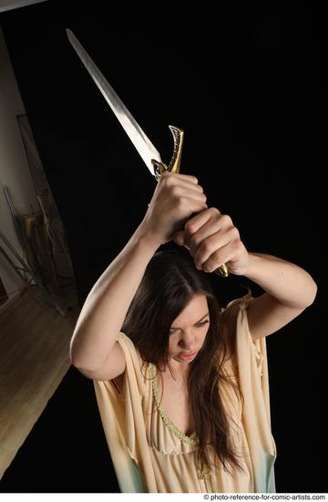 Woman Adult Average White Fighting with sword Standing poses Casual