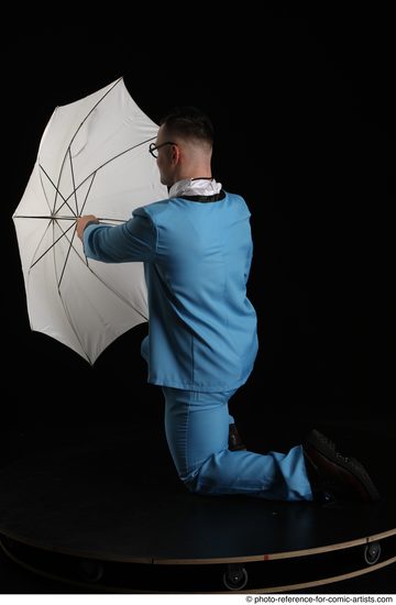 Man Adult Muscular White Fighting without gun Kneeling poses Business