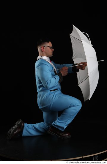 Man Adult Muscular White Fighting without gun Kneeling poses Business