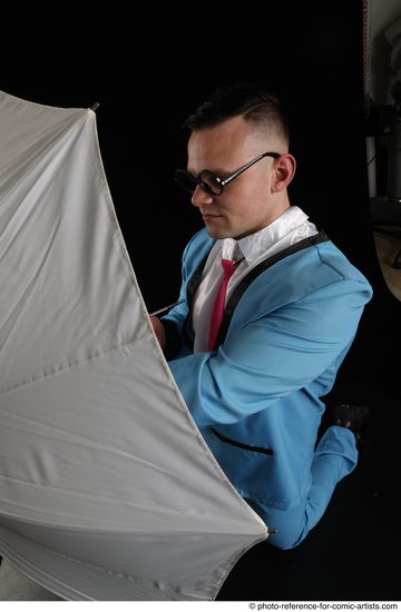 Man Adult Muscular White Fighting without gun Kneeling poses Business