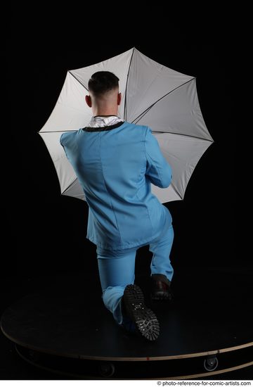 Man Adult Muscular White Fighting without gun Kneeling poses Business