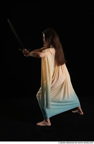 Woman Adult Average Fighting with sword Standing poses Casual Latino