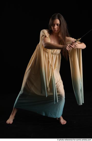 Woman Adult Average Fighting with sword Standing poses Casual Latino