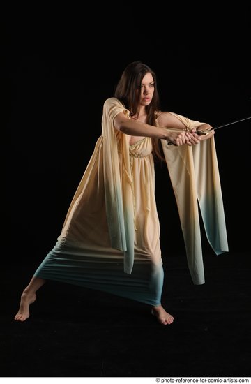 Woman Adult Average Fighting with sword Standing poses Casual Latino