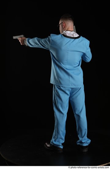 Man Adult Muscular White Fighting with gun Standing poses Business