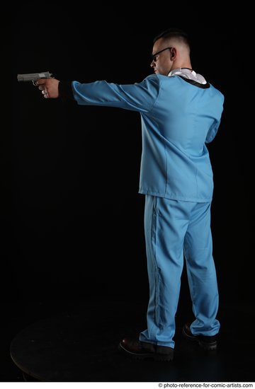 Man Adult Muscular White Fighting with gun Standing poses Business