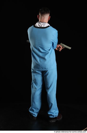 Man Adult Muscular White Fighting with gun Standing poses Business