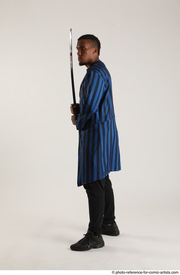 Man Adult Average Black Fighting with sword Standing poses Coat