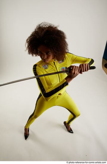 Woman Adult Average Black Fighting with sword Standing poses Casual