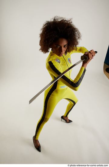 Woman Adult Average Black Fighting with sword Standing poses Casual