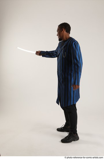 Man Adult Average Black Fighting with sword Standing poses Casual