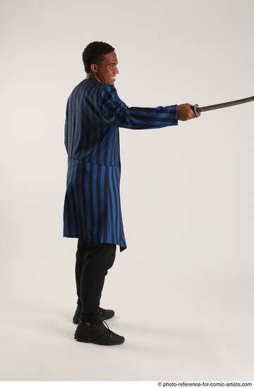 Man Adult Average Black Fighting with sword Standing poses Casual