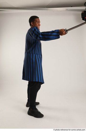 Man Adult Average Black Fighting with sword Standing poses Casual