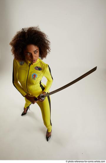 Woman Adult Average Black Fighting with sword Standing poses Casual