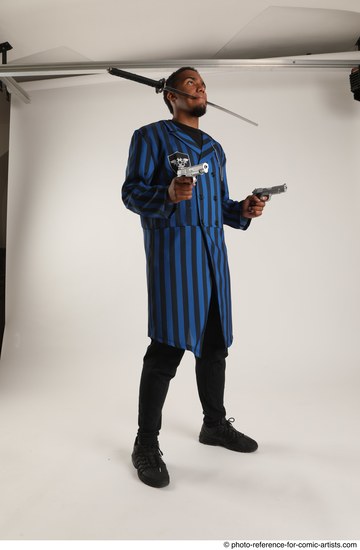 Man Adult Average Black Fighting with gun Standing poses Casual