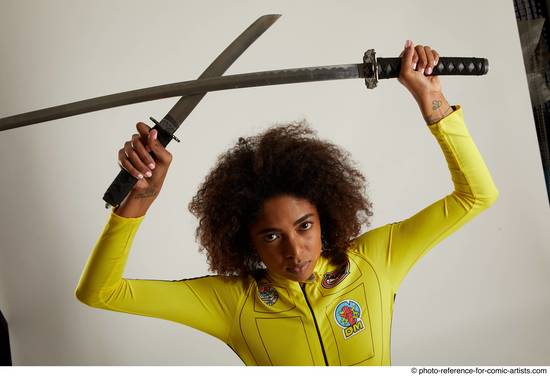 Woman Adult Average Black Fighting with sword Standing poses Casual