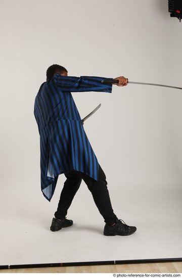 Man Adult Average Black Fighting with sword Standing poses Casual