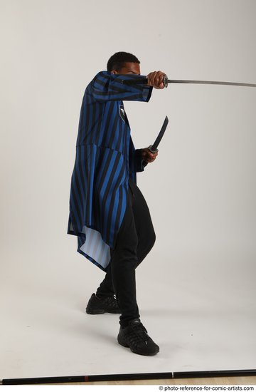 Man Adult Average Black Fighting with sword Standing poses Casual