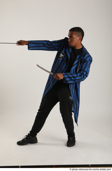 Man Adult Average Black Fighting with sword Standing poses Casual