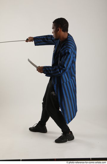 Man Adult Average Black Fighting with sword Standing poses Casual