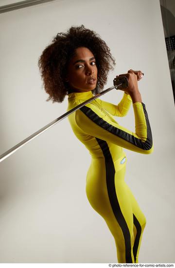 Woman Adult Average Black Fighting with sword Standing poses Casual