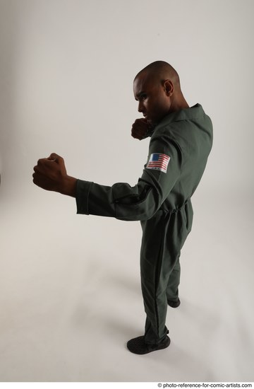 Man Adult Average Black Fighting without gun Standing poses Casual