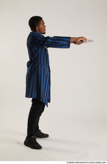 Man Adult Average Black Fighting with gun Standing poses Casual