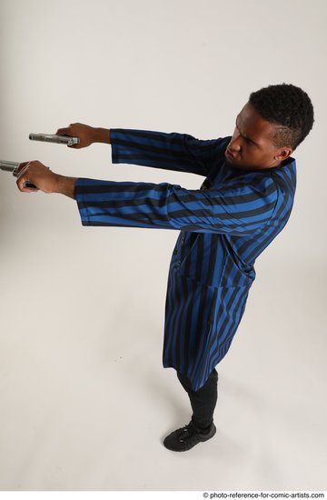 Man Adult Average Black Fighting with gun Standing poses Casual