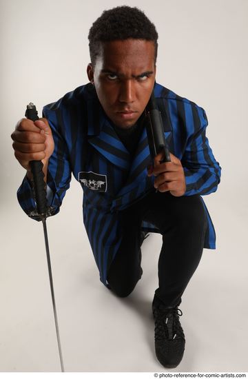 Man Adult Average Black Kneeling poses Casual Fighting with shotgun