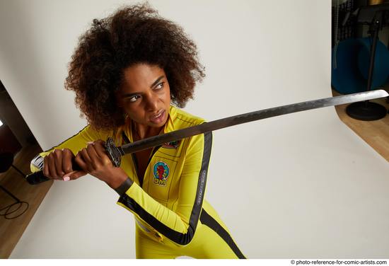 Woman Adult Average Black Fighting with sword Standing poses Casual