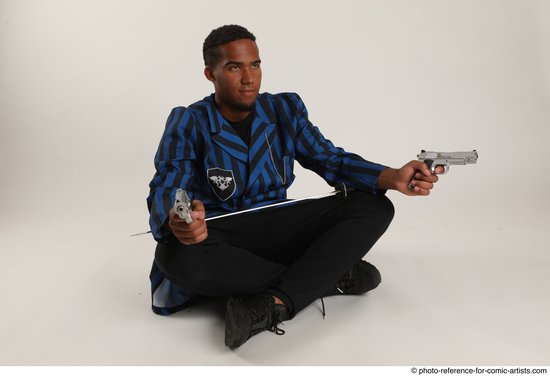 Man Adult Average Black Fighting with gun Sitting poses Casual