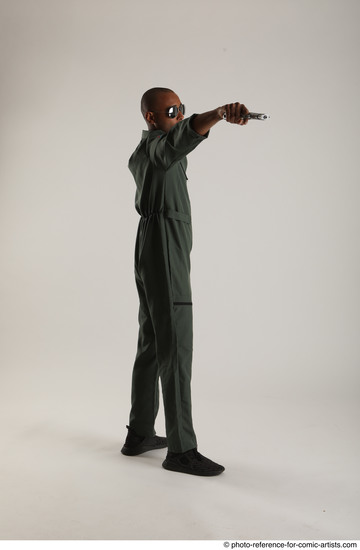 Man Adult Average Black Fighting with gun Standing poses Casual