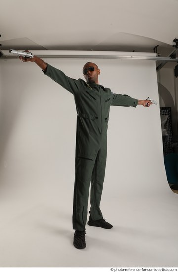 Man Adult Average Black Fighting with gun Standing poses Casual