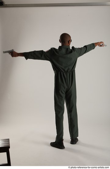 Man Adult Average Black Fighting with gun Standing poses Casual