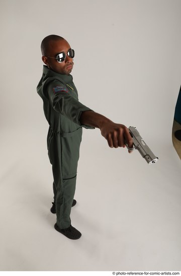 Man Adult Average Black Fighting with gun Standing poses Casual