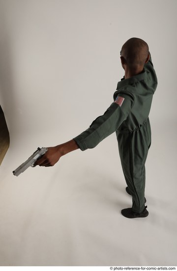 Man Adult Average Black Fighting with gun Standing poses Casual