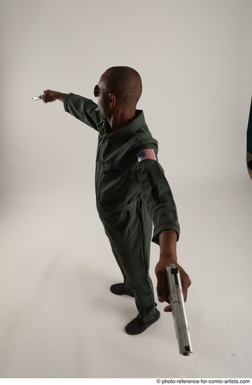 Man Adult Average Black Fighting with gun Standing poses Casual